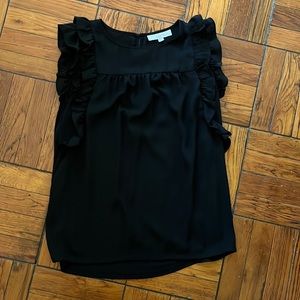 ruffled sleeveless top